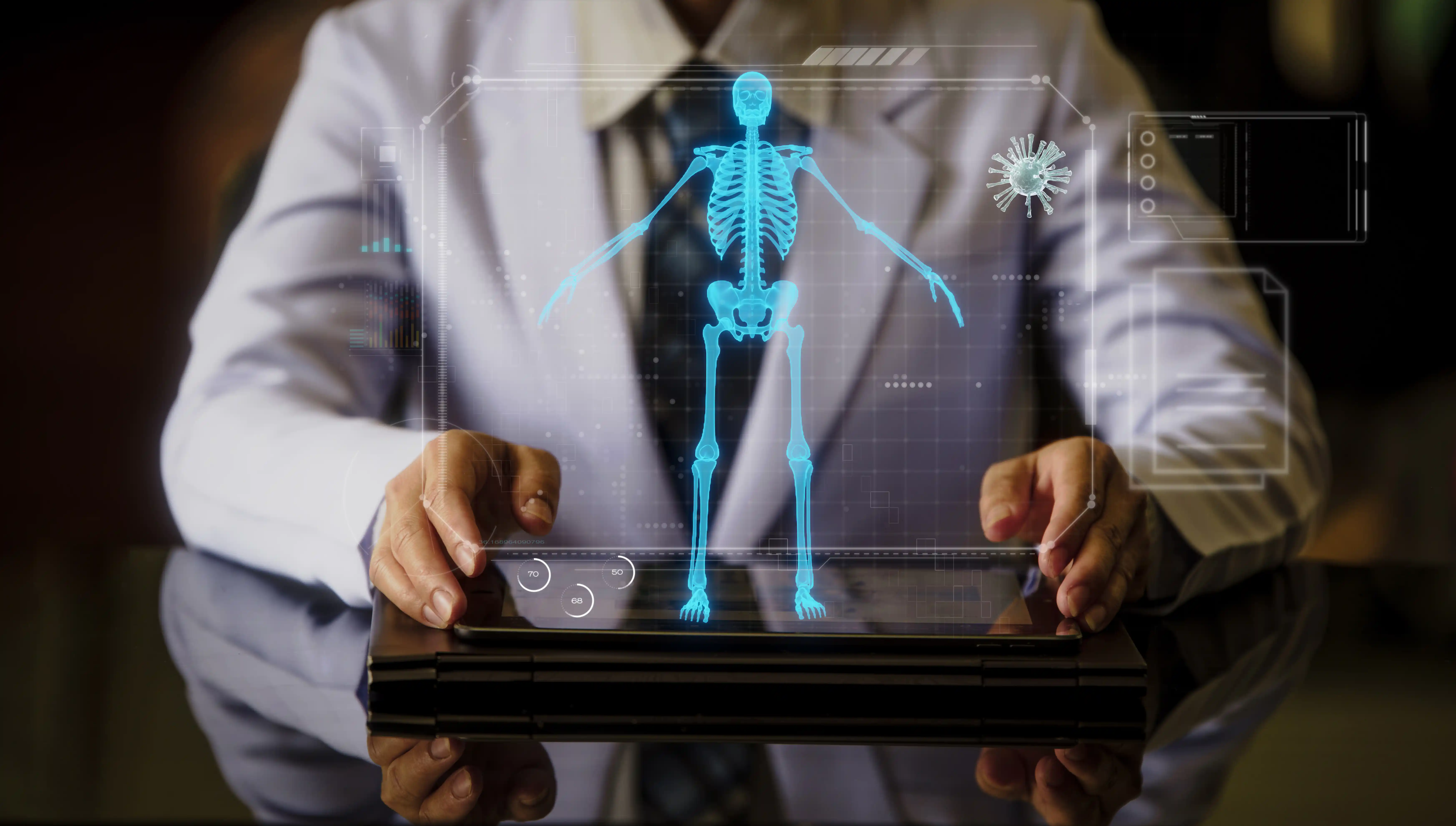 Dr. Reynolds demonstrating advanced orthopedic technology